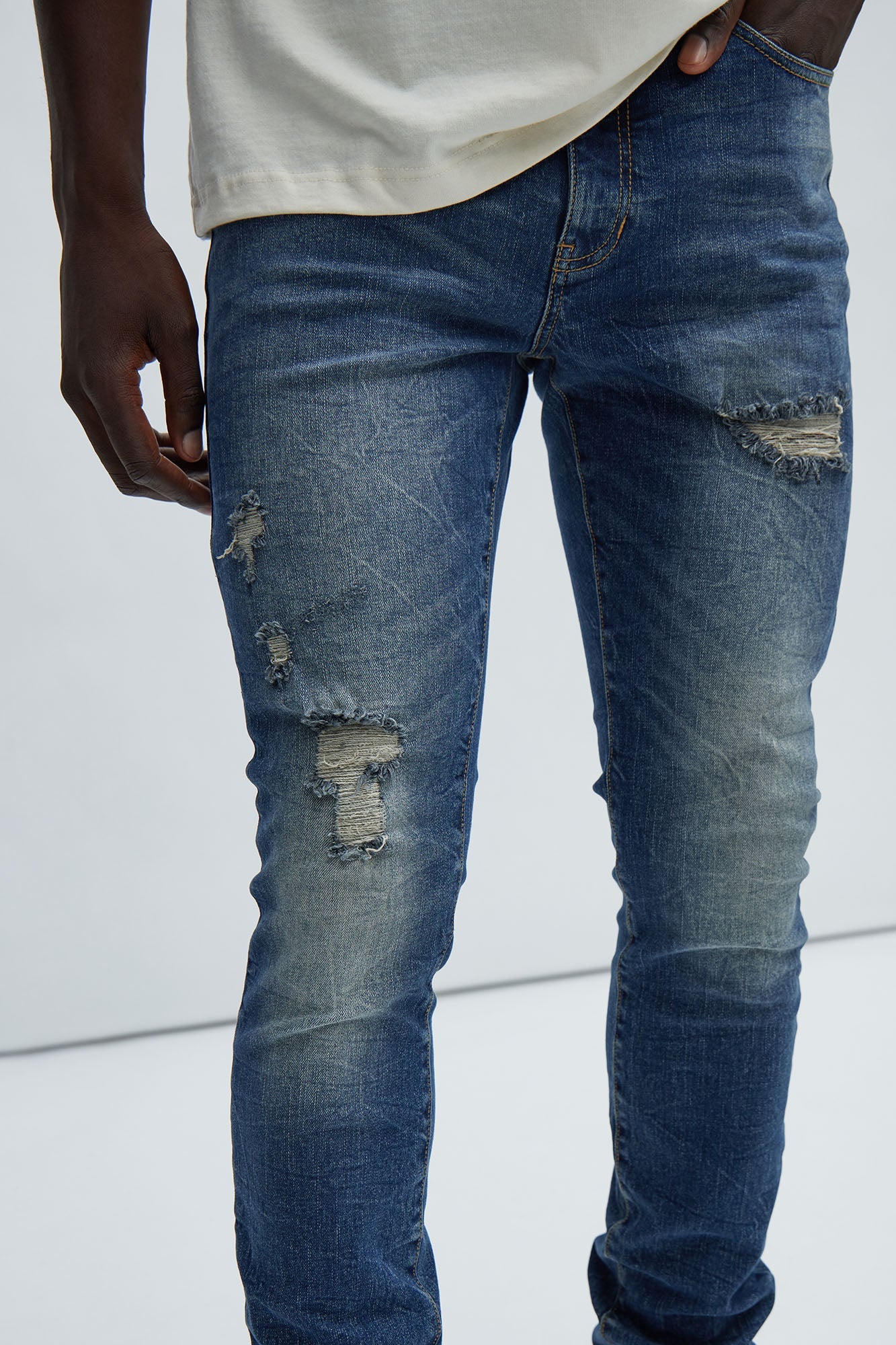 Primary Distressed Stacked Skinny Jeans - Dark Wash