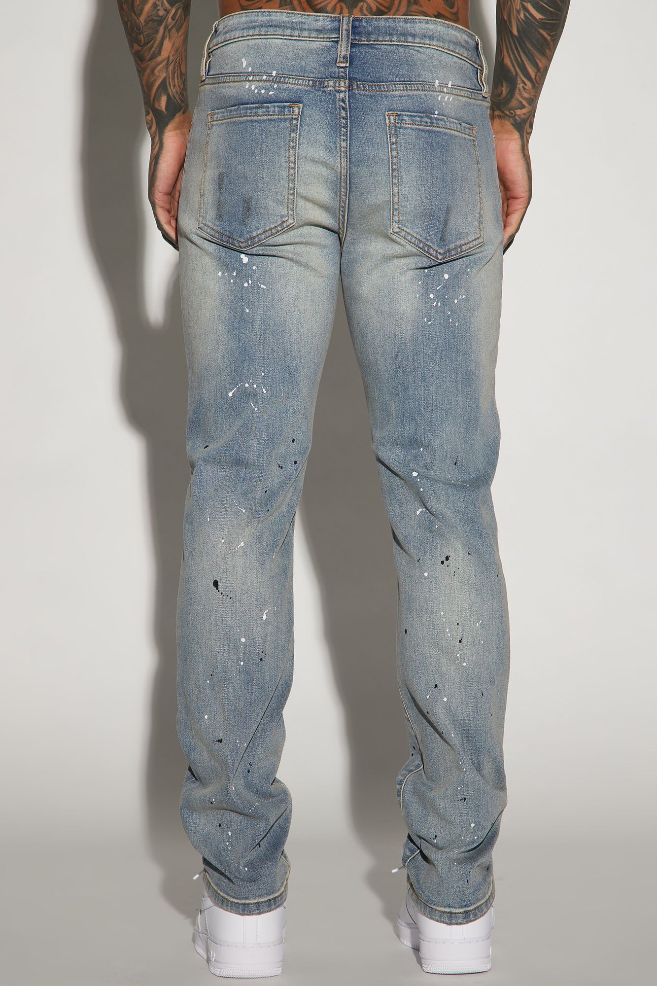 Ripped And Bleach Splatter Slim Jeans - Light Blue Wash