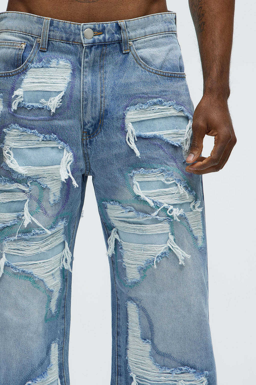 Worn All Over Distressed Baggy Jeans - Light Wash