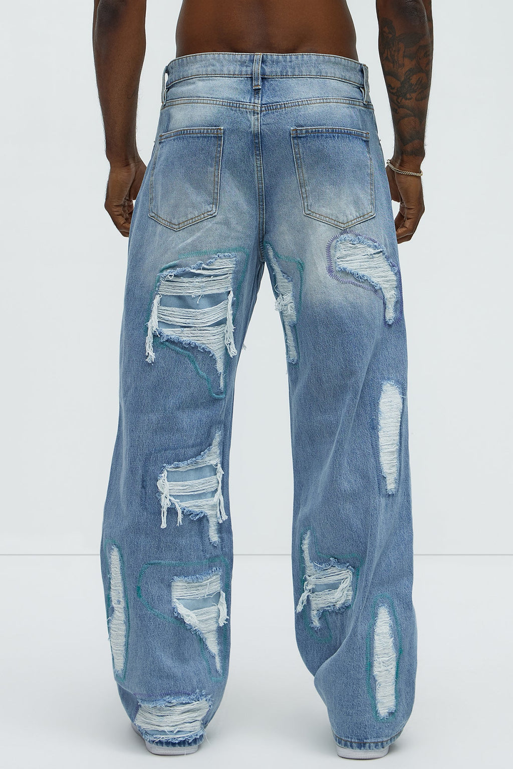 Worn All Over Distressed Baggy Jeans - Light Wash