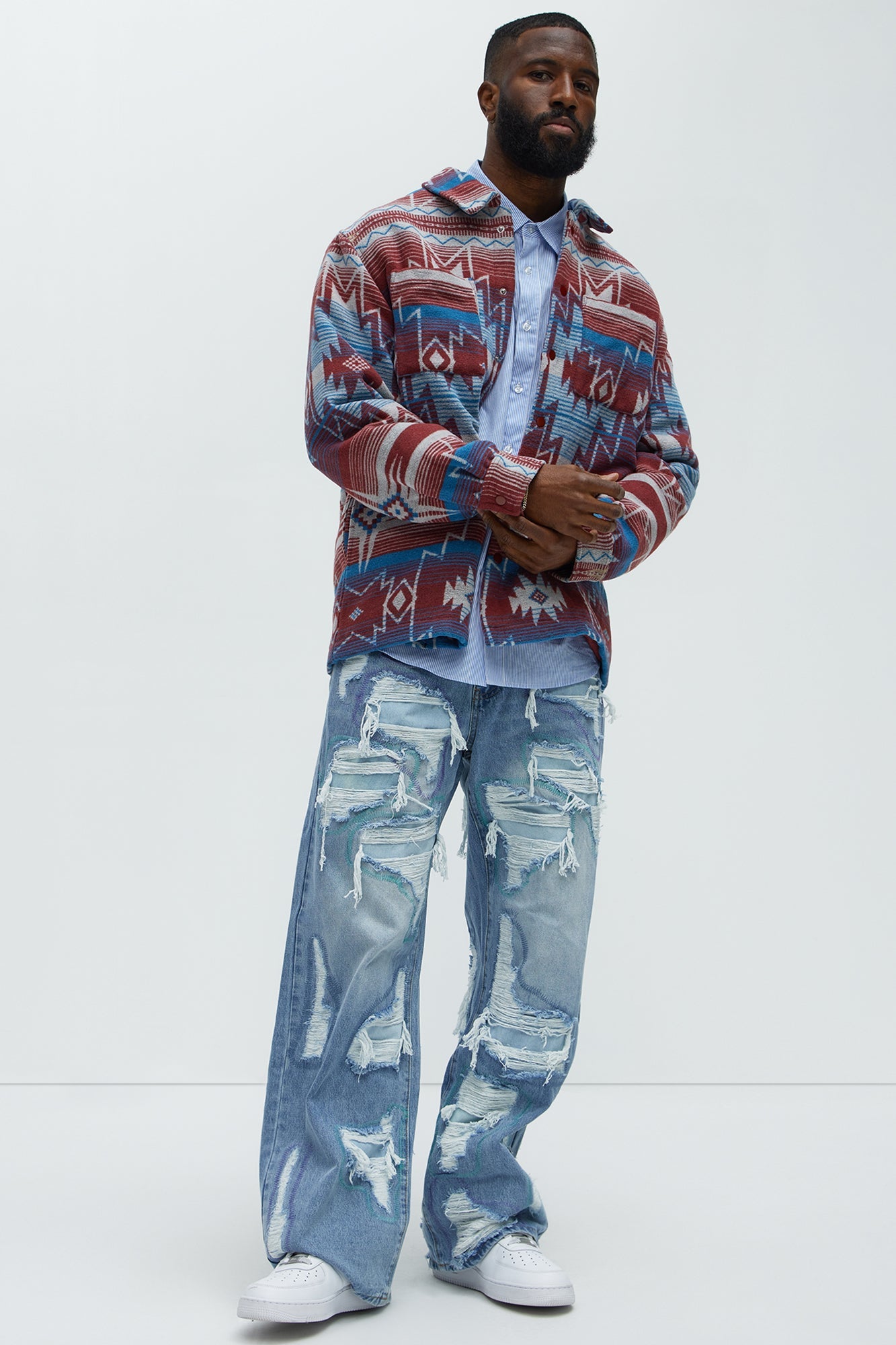 Worn All Over Distressed Baggy Jeans - Light Wash