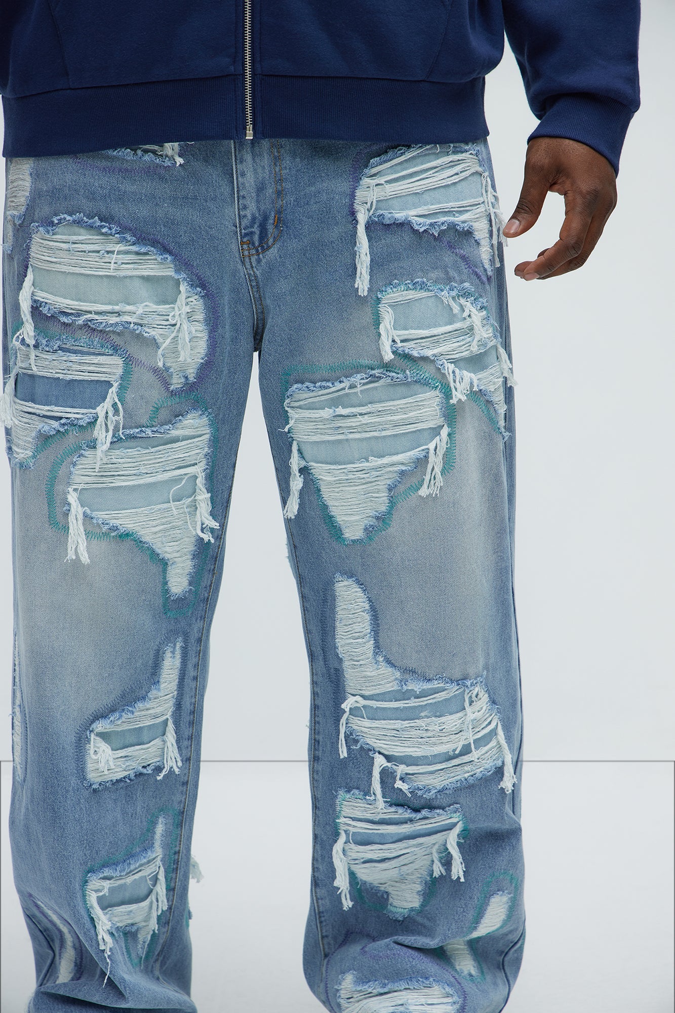 Worn All Over Distressed Baggy Jeans - Light Wash