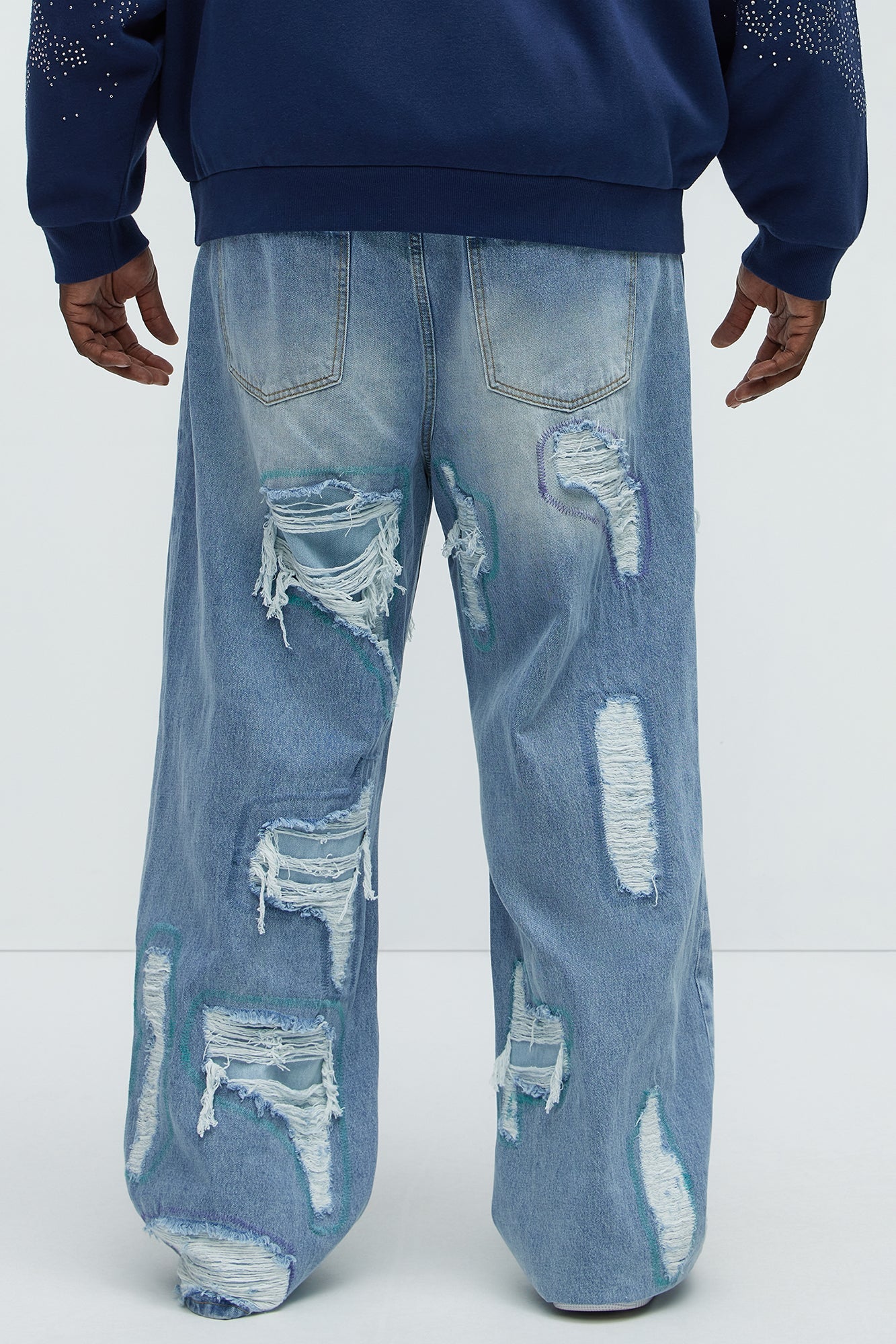 Worn All Over Distressed Baggy Jeans - Light Wash