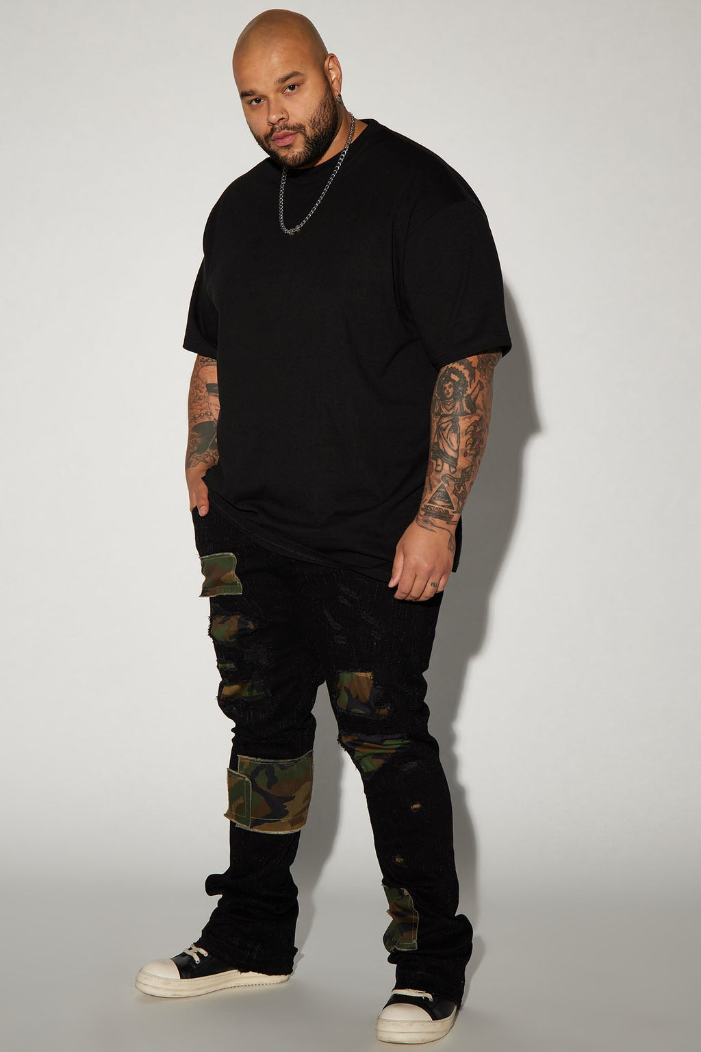 Hint Of Camo Stacked Skinny Flare Jeans - Black