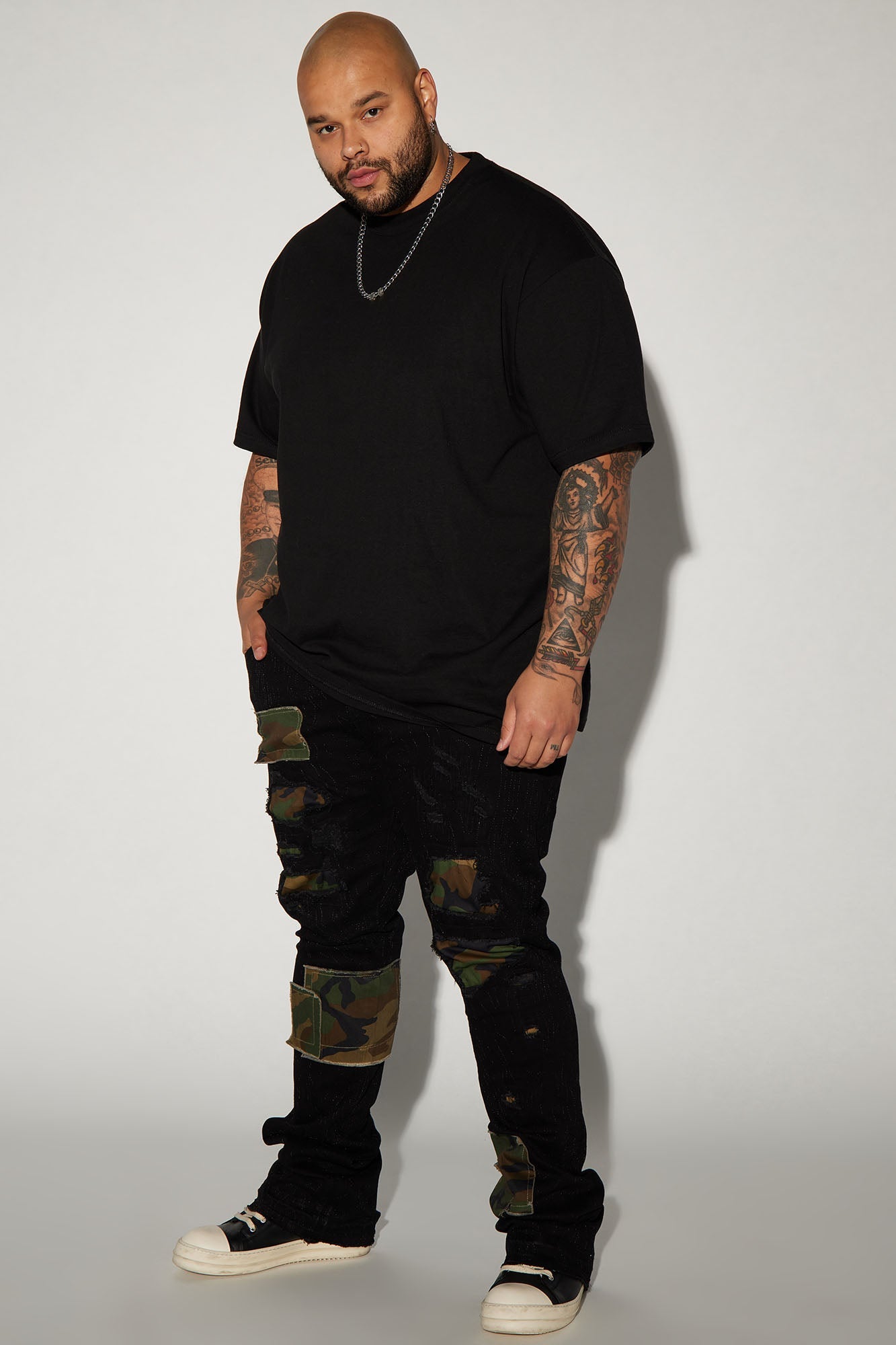Hint Of Camo Stacked Skinny Flare Jeans - Black